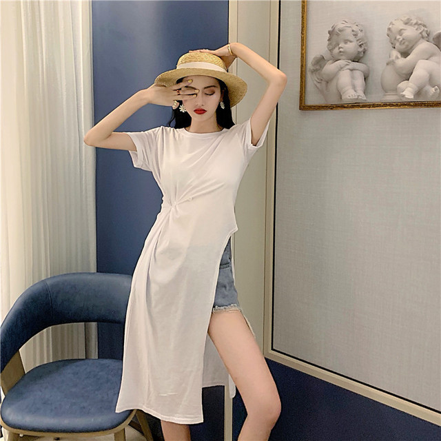 Prix usine saison nouveau port chic conception de temperament sentiment amincissant fente cote machine longue t shirt jupe femme