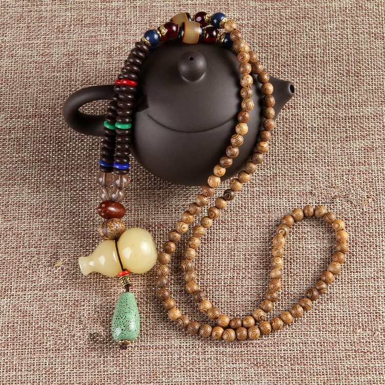 Collier ethnique vintage perle en forme de calebasse en cire dabeille turquoise collier charmant de chandail pour femme