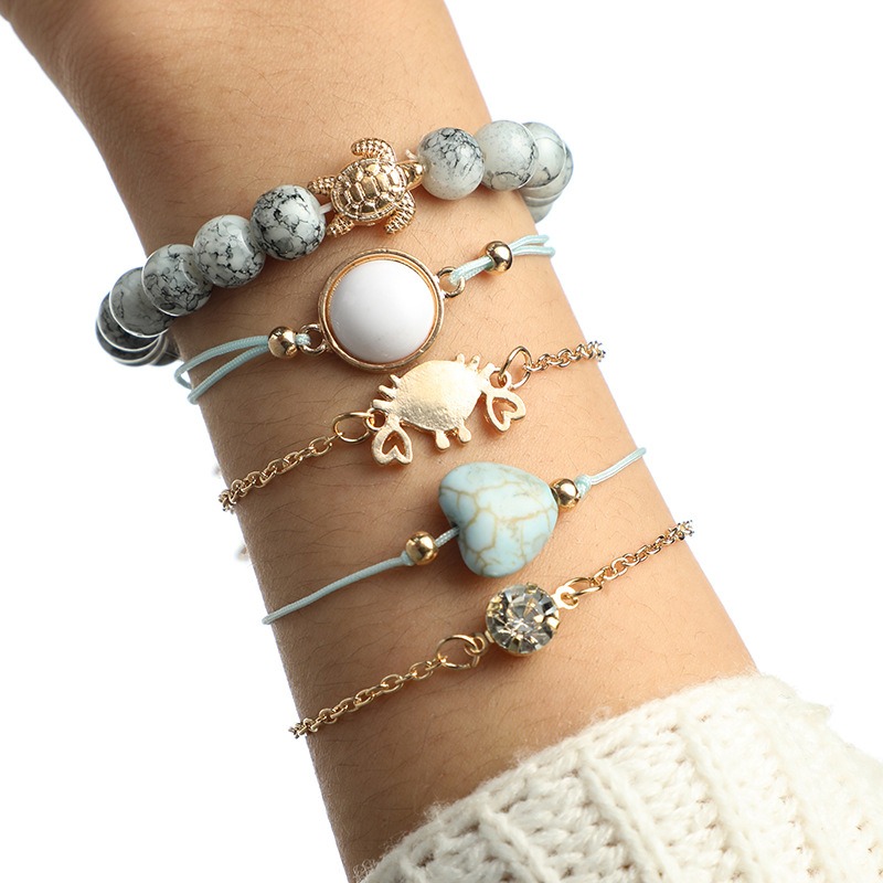 Bracelet serti de diamants ethniques Bracelet tisse avec coeur en forme de coeur et bracelet en perles de tortue en alliage gris